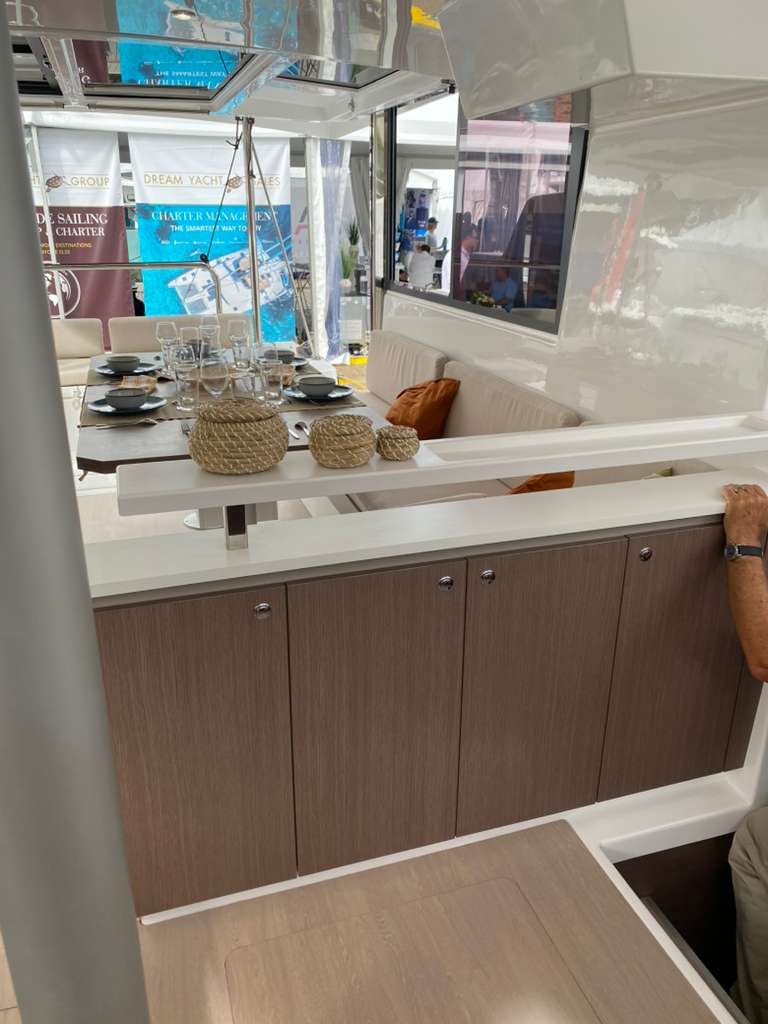 Bali Catspace salon view showing dining table and galley